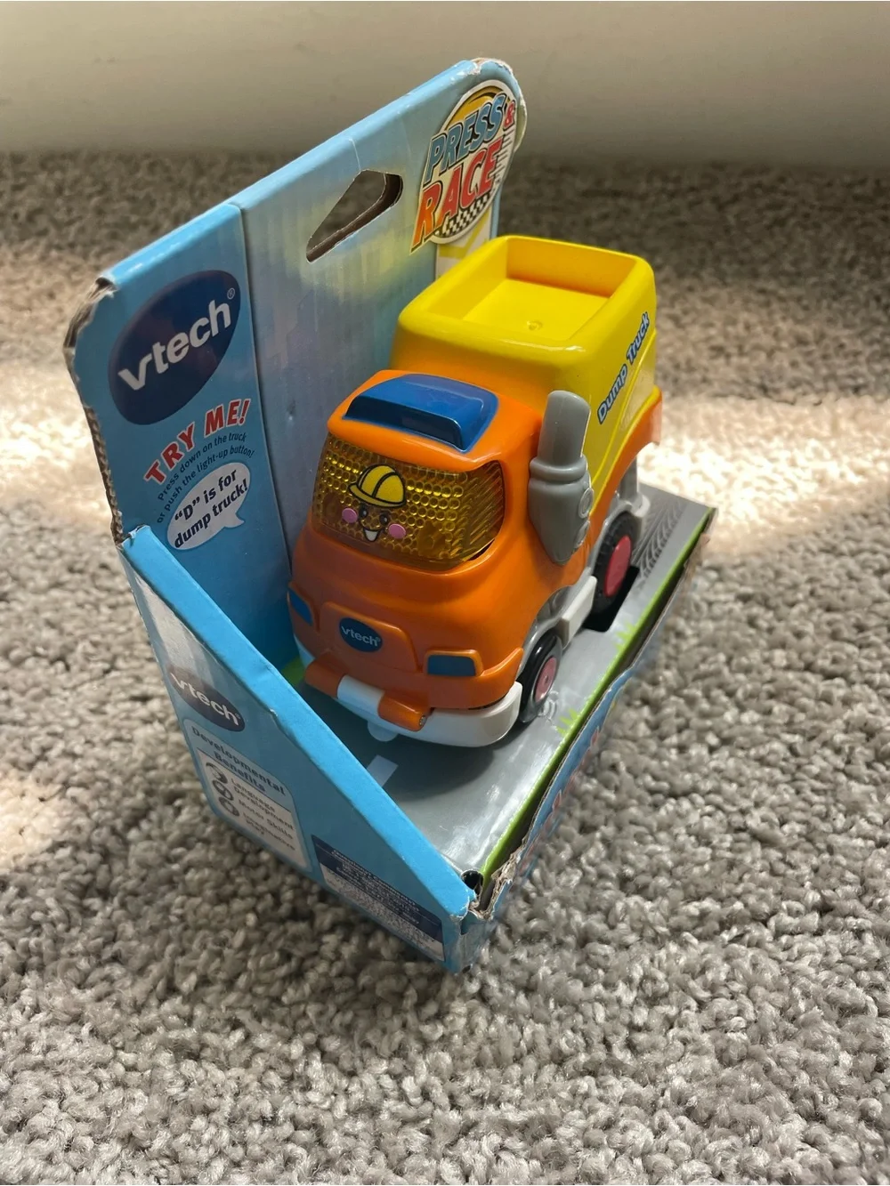 Go! Go! Smart Wheels Press & Race Orange and Yellow Dump Truck